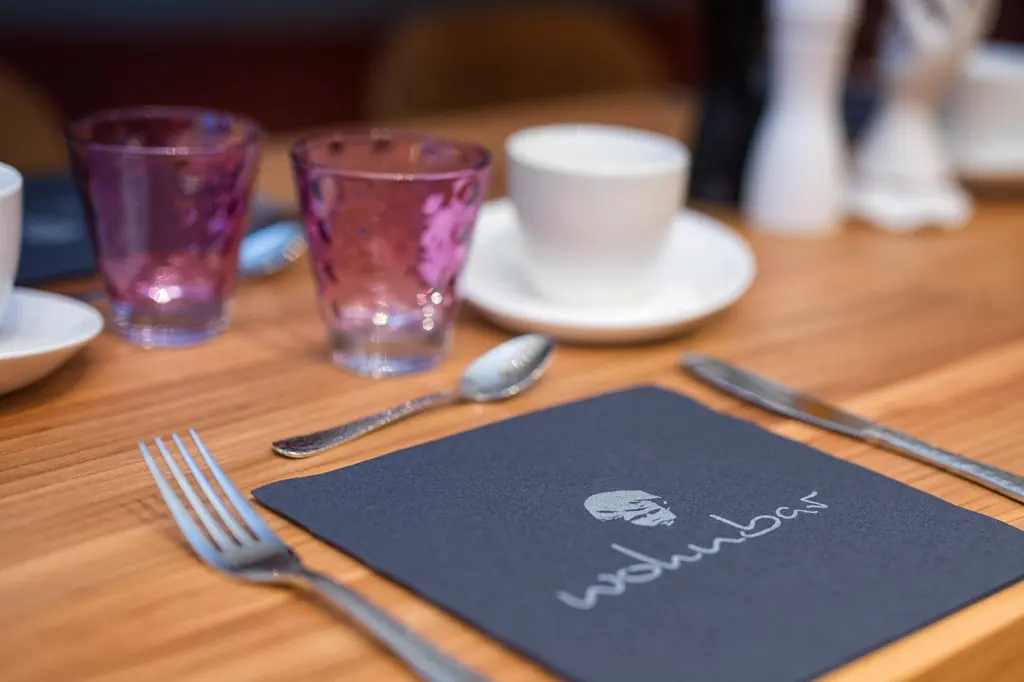 Breakfast table laid for guests